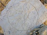 Tibet Kailash 06 Tirthapuri 04 Mani Mandala on Rock As we walked by the side of the river, one of the Tibetan Guides for another group pointed out this beautiful carving of a mandala of Om Mani Padme Hum.